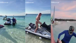 Malandrinha dá uma sarrada no piloto de jet ski na praia